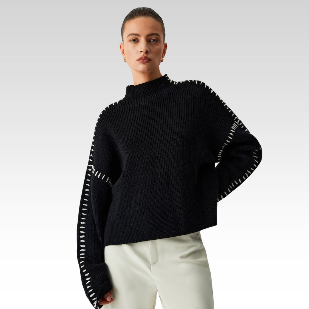 Alma | Pulover oversize s turtleneckom in pikčastimi detajli